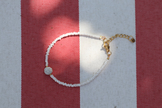 Armband: witte natuursteen - goud